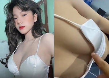 Chàng trai nghịch ngợm vuốt ve vòng một của cô gái xinh đẹp